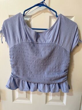 Free People Periwinkle Smocked Peplum Top Size M 💙